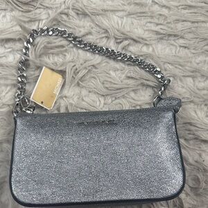 NWT Michael Kors Glitter Silver Wristlet. Pouch/clutches